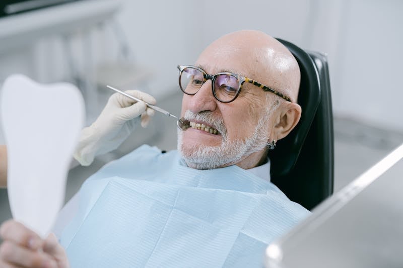 Patient in dental chair consultation