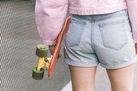 Person in Blue Denim Shorts