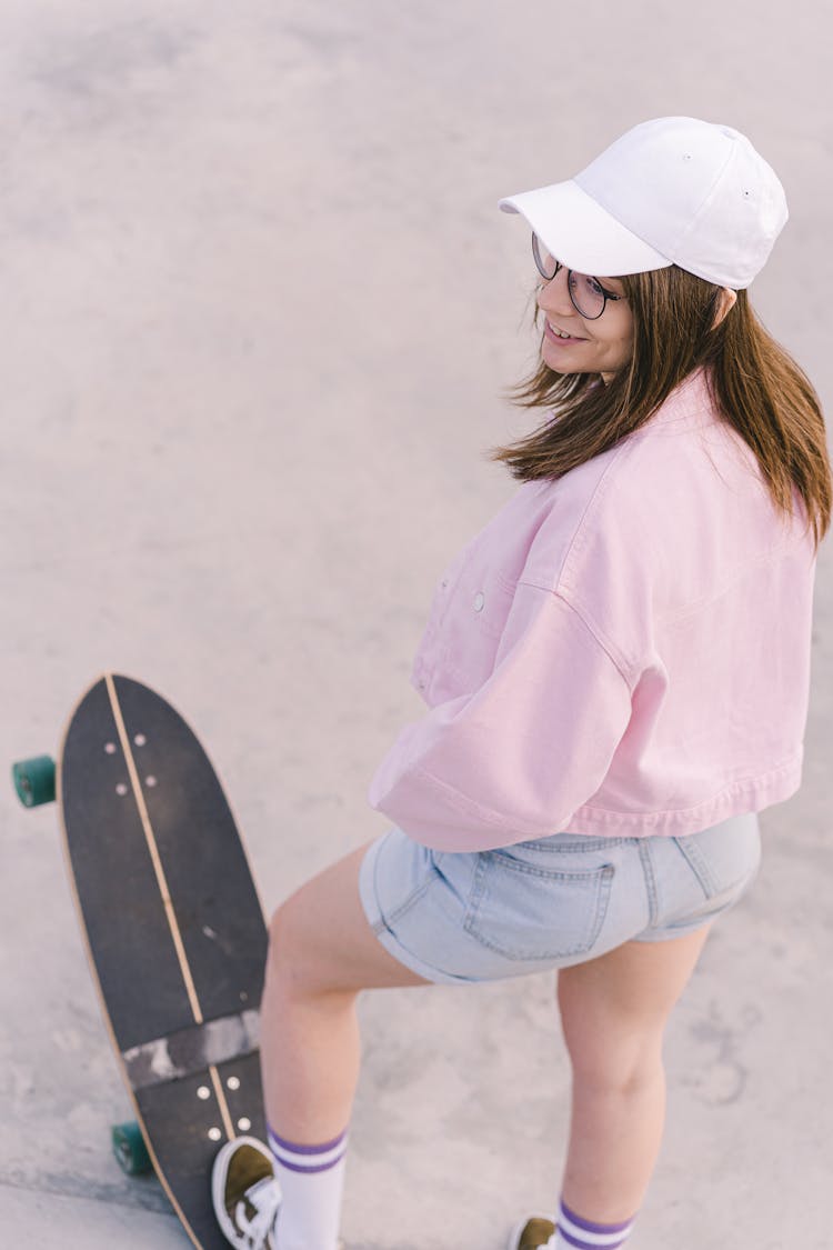 High-Angle Shot Of A Woman In Jacket And Shorts