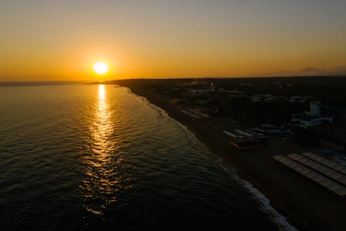 Fotos de stock gratuitas de amanecer, anochecer, costa