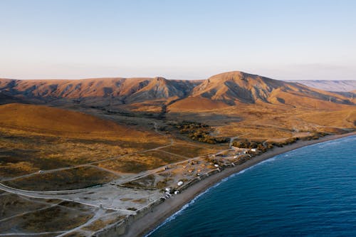 Безкоштовне стокове фото на тему «Аерофотозйомка, берег, гори»