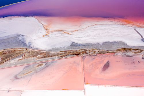 Free Vibrant aerial capture of unique pink salt flats featuring striking color variations. Stock Photo