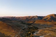 Brown and Green Mountains Under Blue Sky