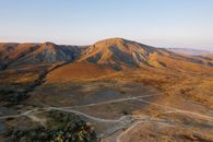 Brown Mountain Under Blue Sky
