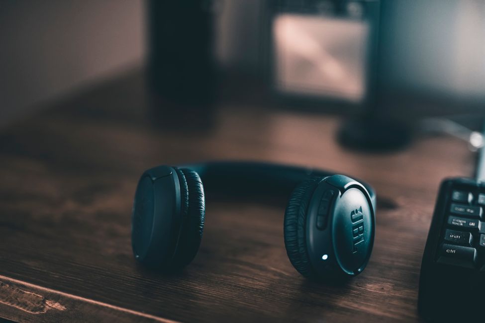 Headphones on wooden desk