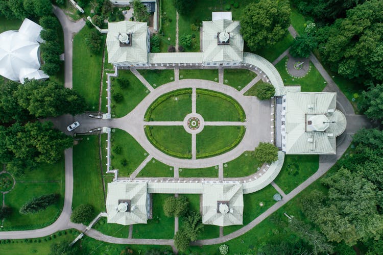 Aerial View Of Green Trees And White Building