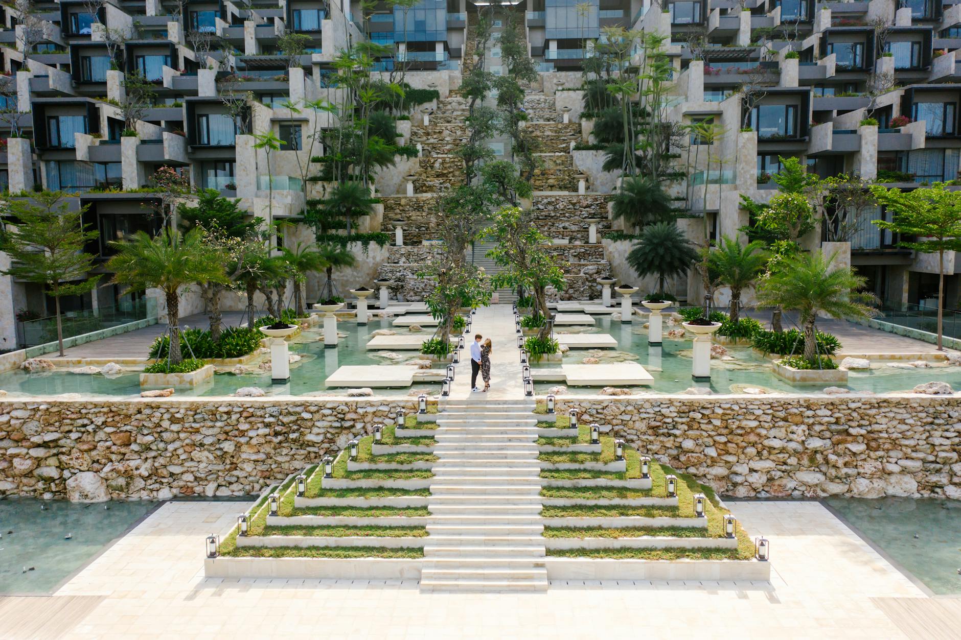https://www.pexels.com/photo/gray-concrete-stairs-with-green-plants-8414417/