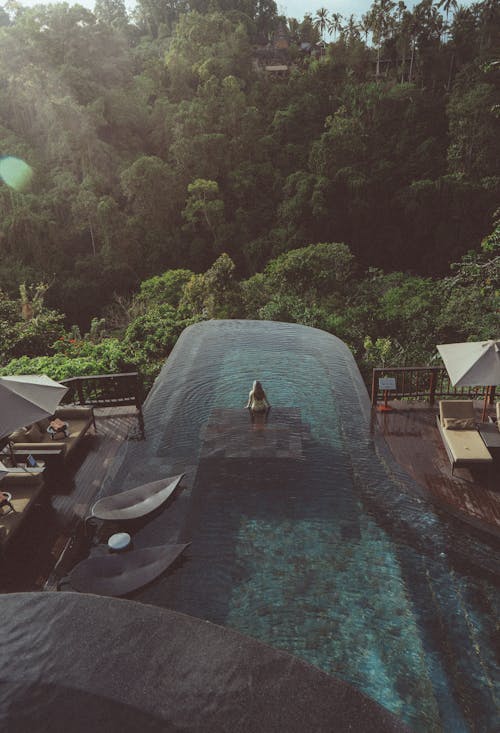 Aerial Footage of Person on a Pool 