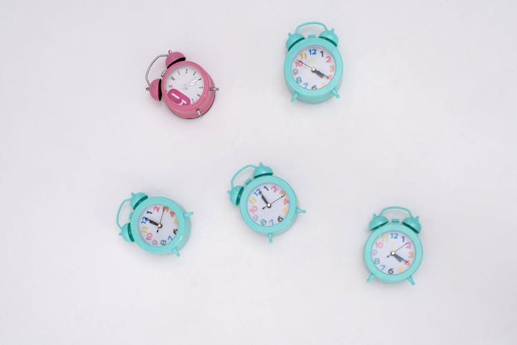 Alarm Clocks On White Background