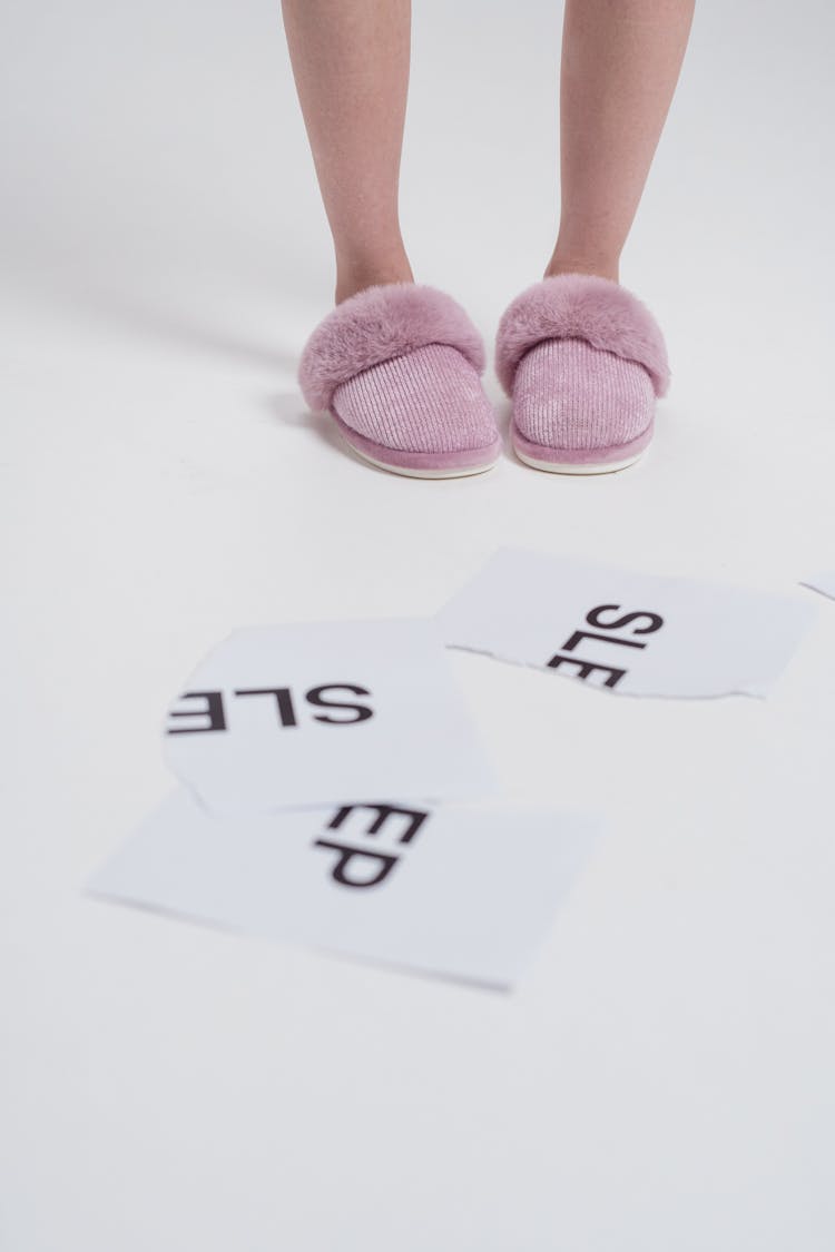 Person Wearing Pink Bedroom Slippers