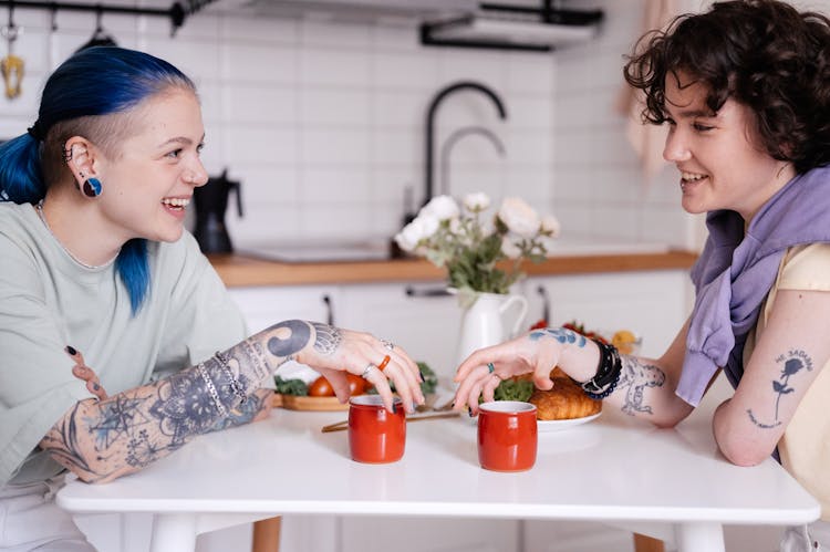 Two Women Talking Together 