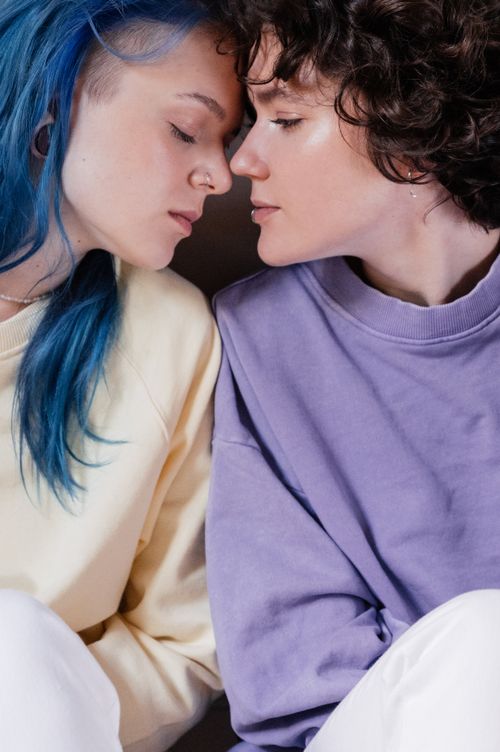 Free Intimate portrait of two women embracing their love and togetherness. Stock Photo