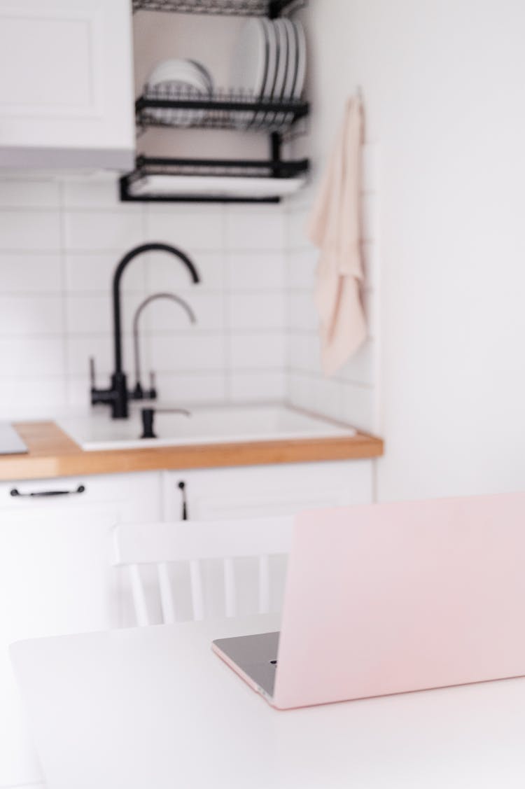 White Laptop On Kitchen Counter