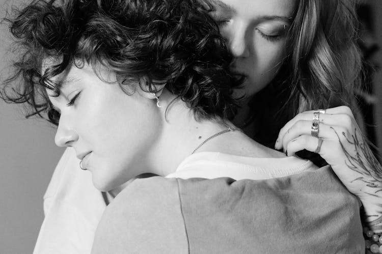 Black And White Portrait Of Couple Embracing