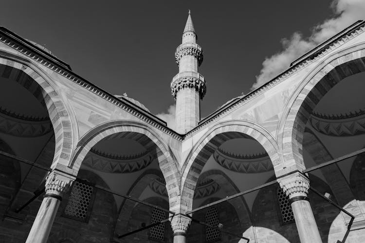 Low Angle View Of Minaret Towering Above Mosque