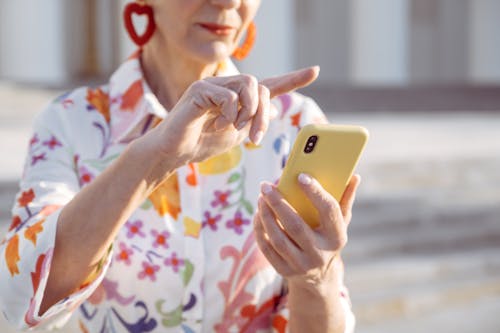 Free A Woman Using Her Mobile Phone Stock Photo
