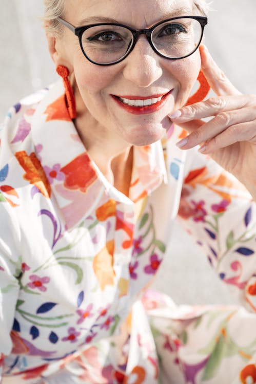 Free Woman in White Orange and Blue Floral Button Up Shirt Stock Photo