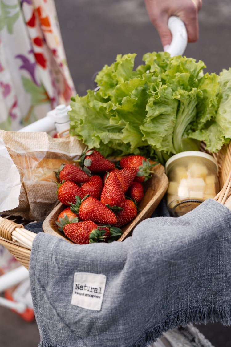 Strawberries And Lettuce In A Basket
