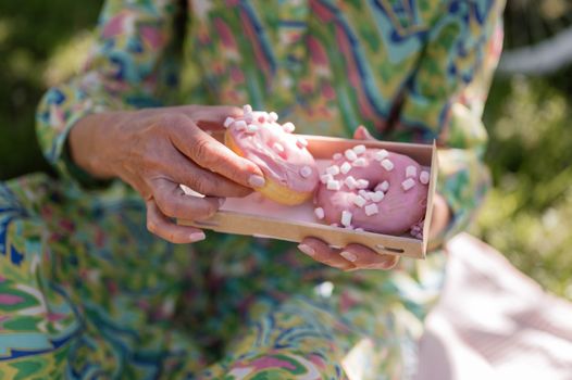 Person Holding Brown Wooden Box With White and Brown Eggs
