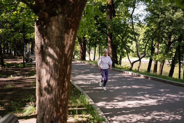 Photo Of An Elderly Woman Jogging