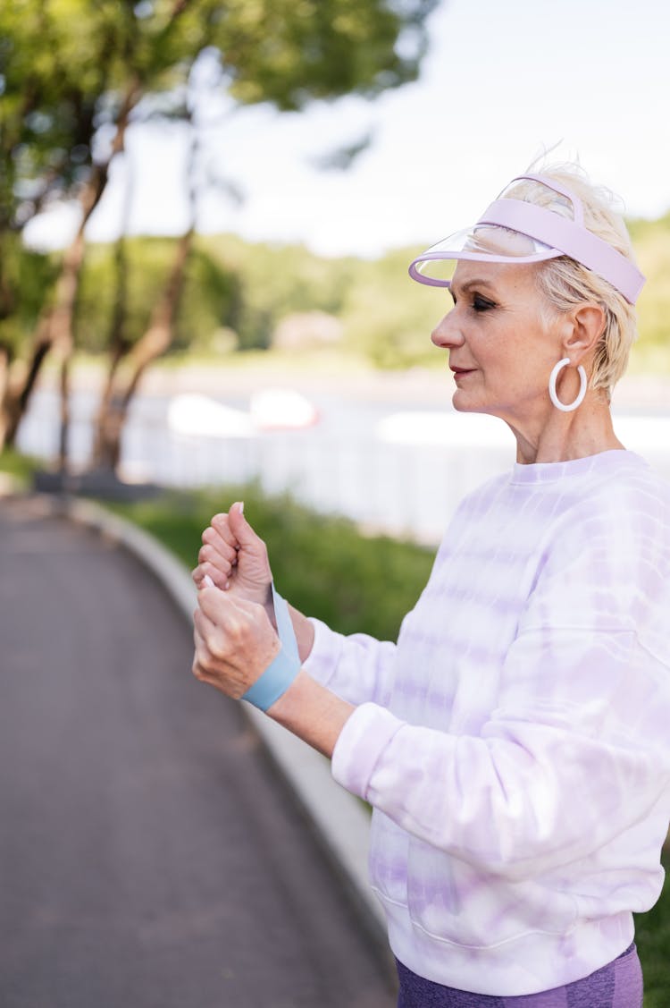 A Woman Exercising With A Resistance Band 