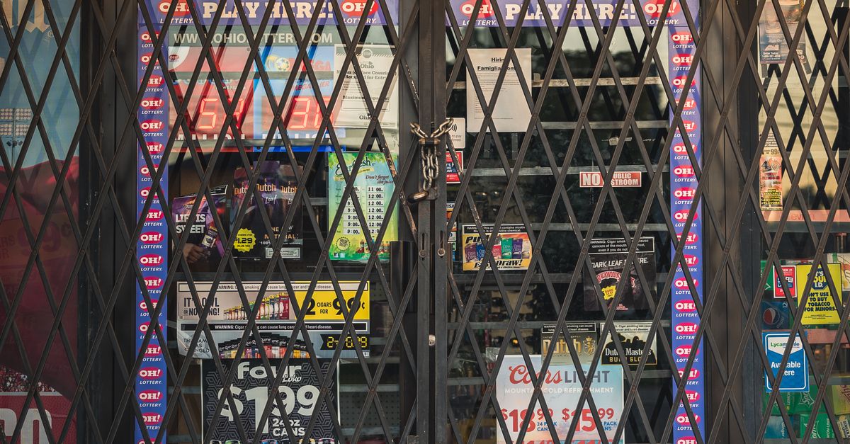 Closed Shop Example Closed Shop with Door Protected by Bars · Free Stock Photo