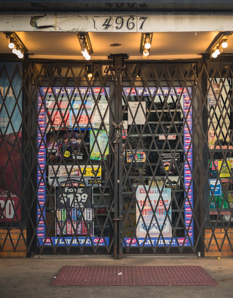 Closed Shop With Door Protected By Bars