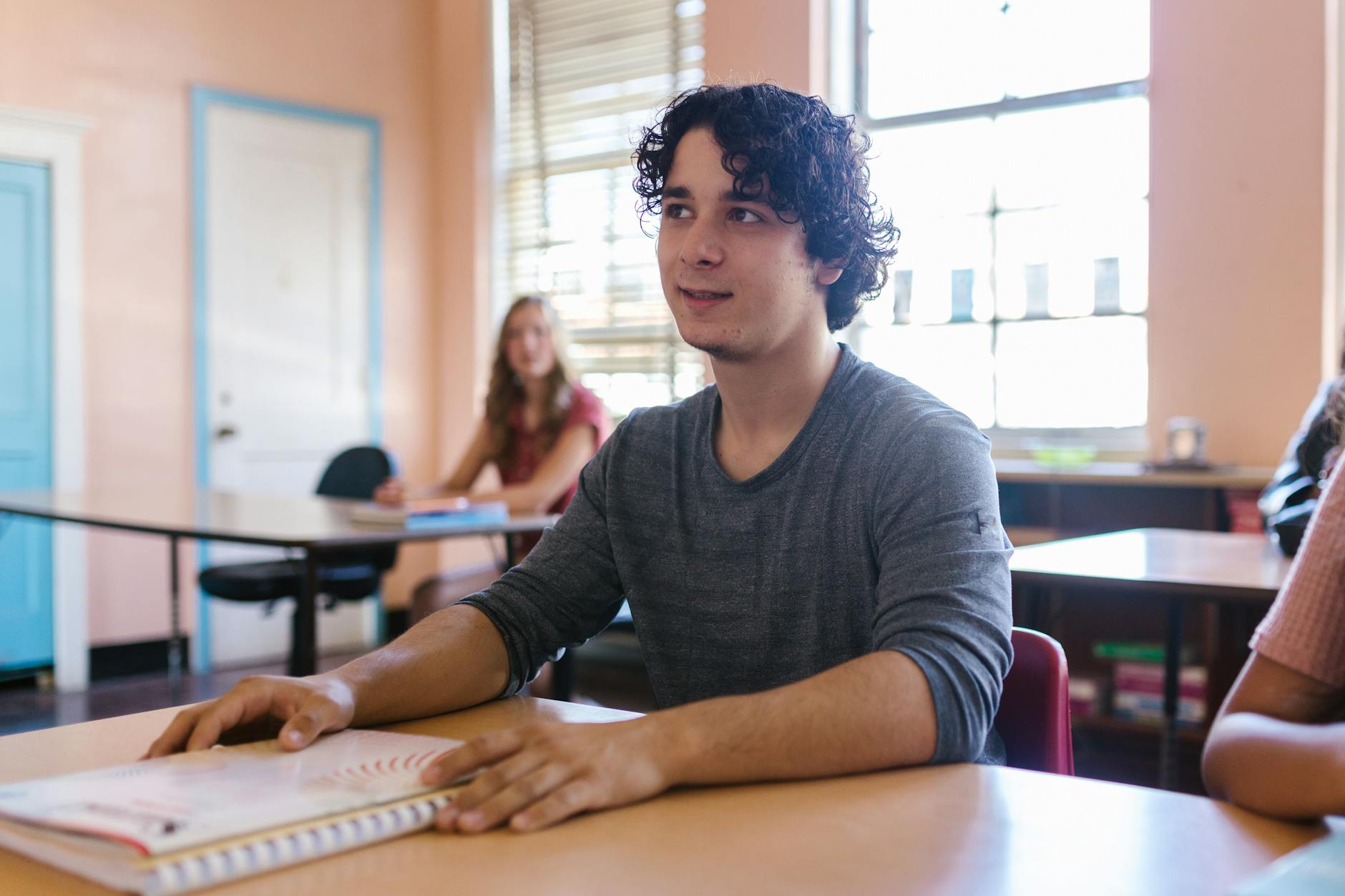 A Man Sitting in the Classroom