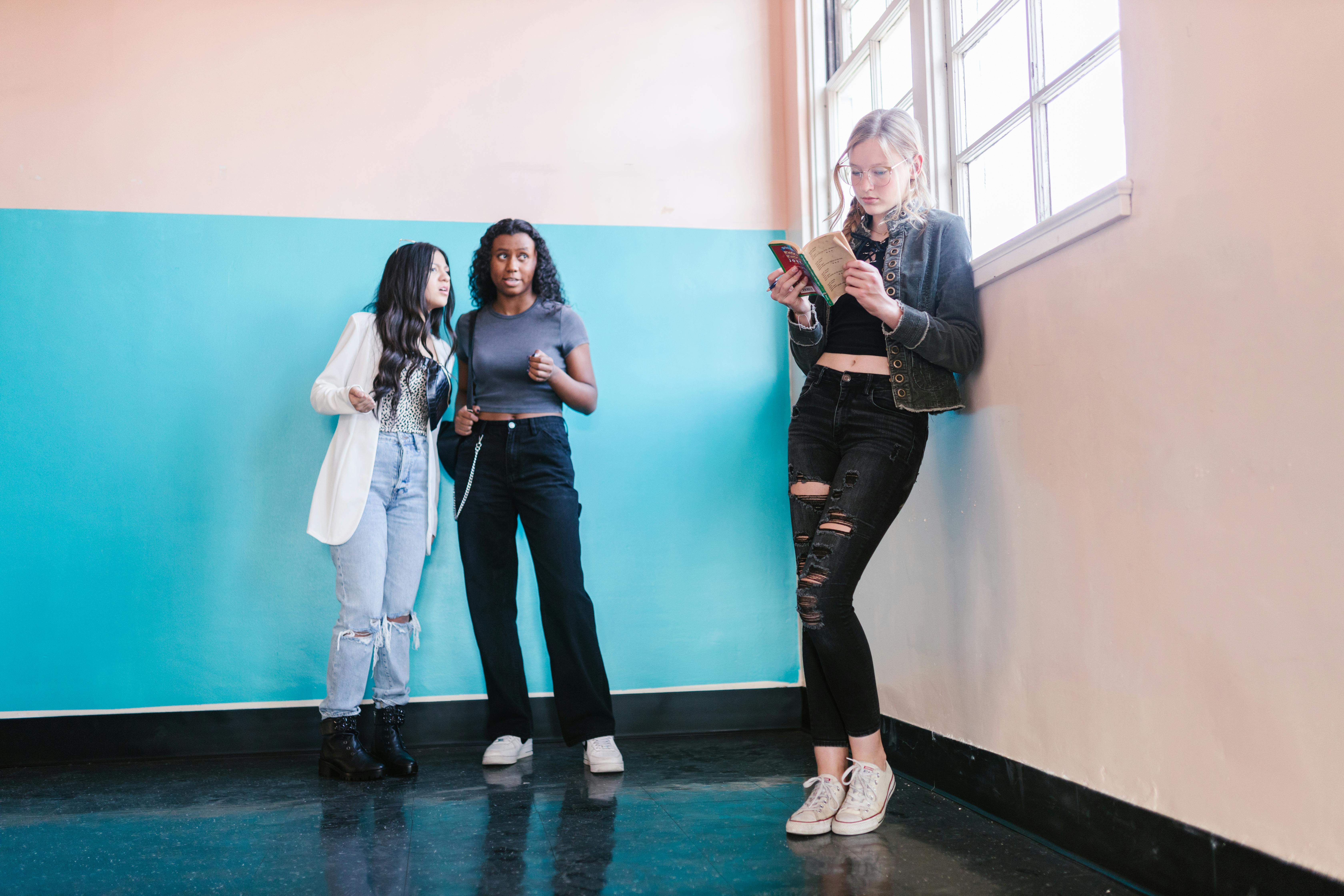 Two Women Bullying a Woman in the School