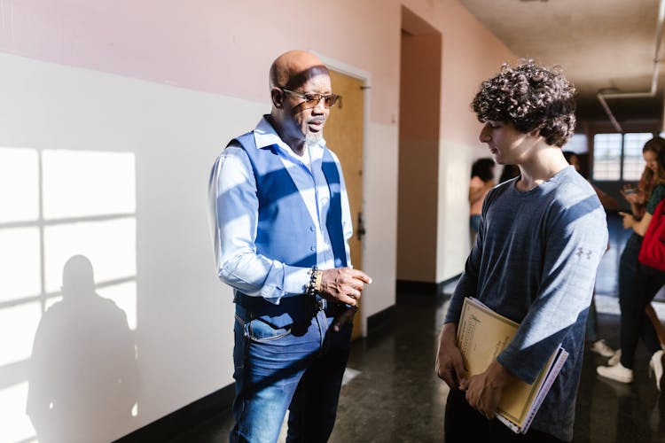 A Teacher Talking To His Student