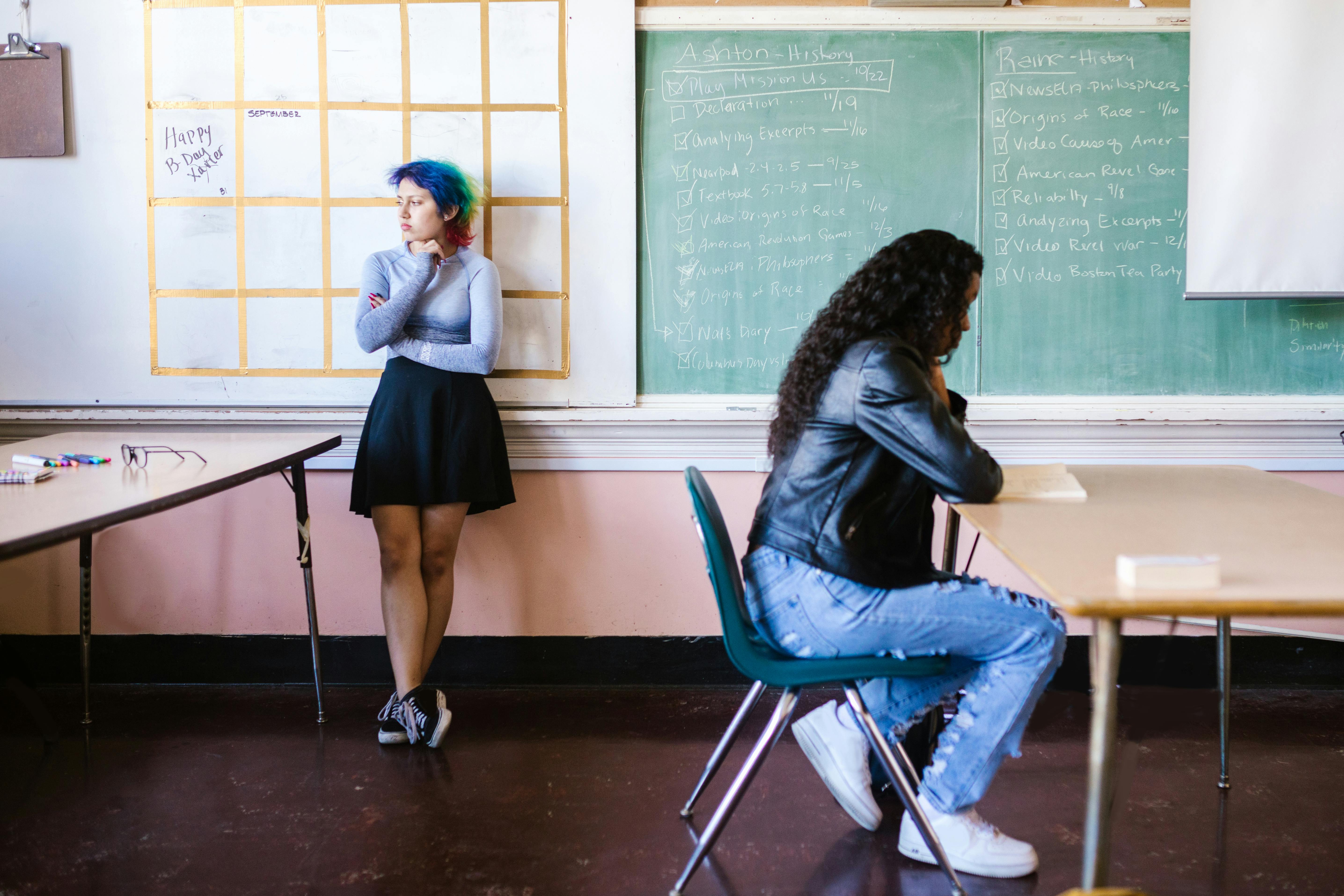 A Student Sitting Inside the Classroom · Free Stock Photo