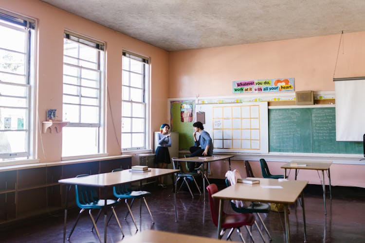 Students Talking Inside The Classroom