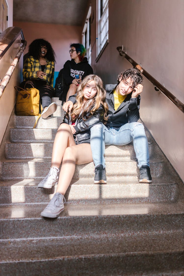 A Students Sitting On The Stairs