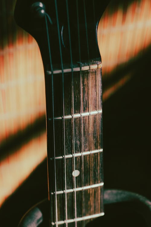Gratis stockfoto met akoestische gitaar, detailopname, fretboard Stockfoto