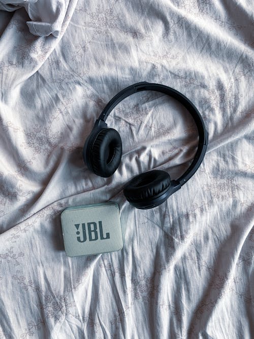 A JBL Speaker and Wireless Headphones