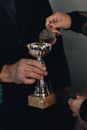 Priest Holding a Chalice