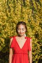 Girl in Red Sleeveless Dress Smiling