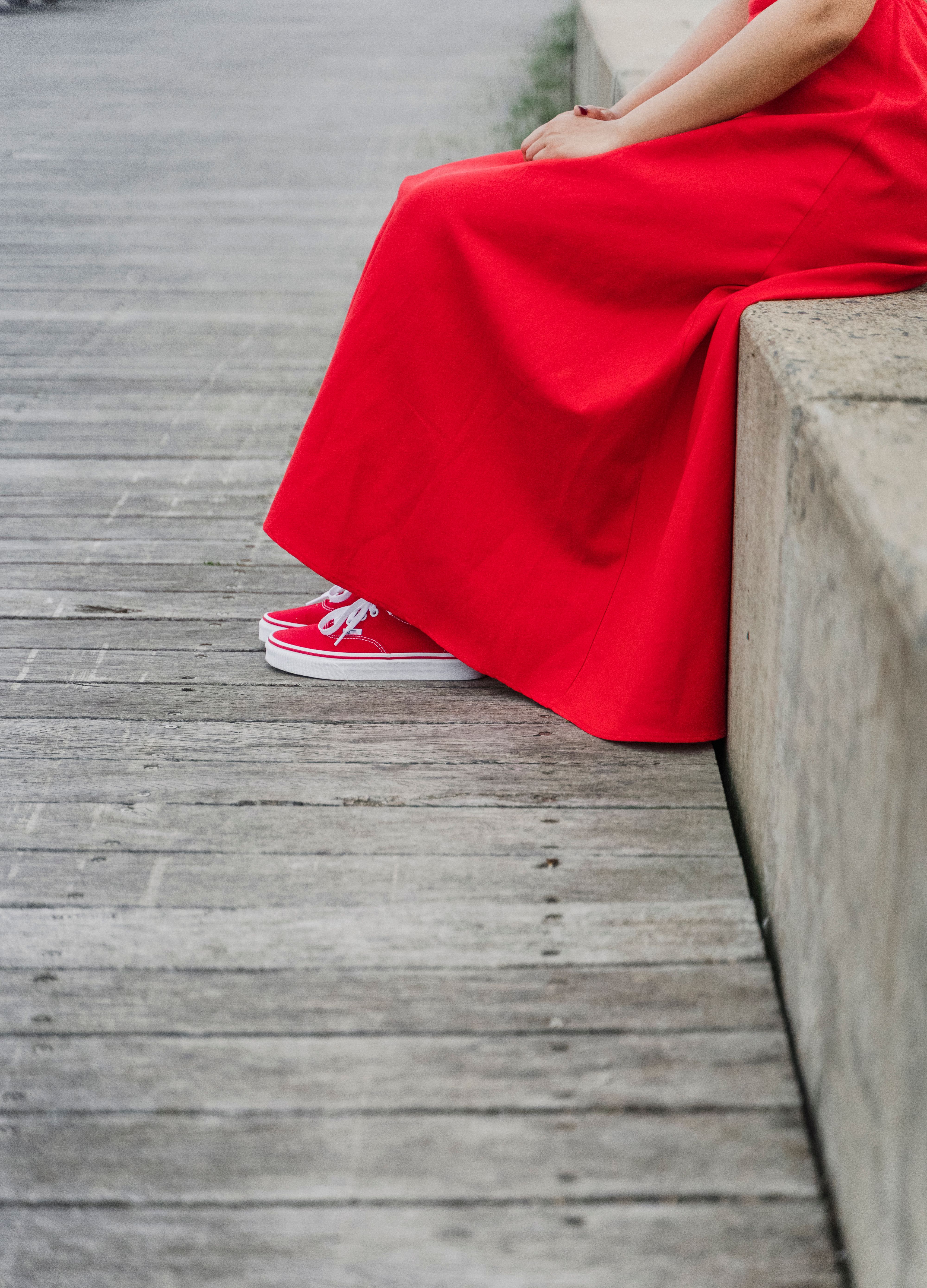Person Wearing Red Dress and Red Sneakers · Free Stock Photo