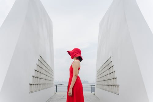 Side View of a Woman in Red Sleeveless Dress