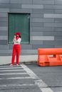 Woman Standing at the End of the Pedestrian Lane