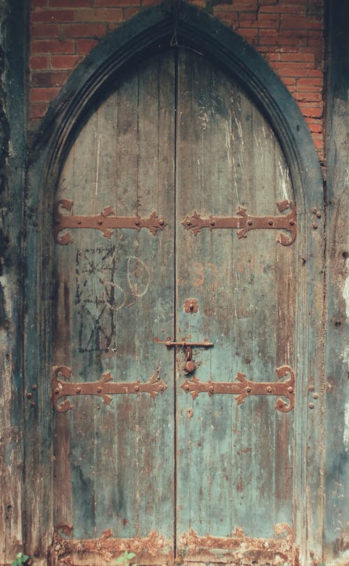 Brown Wooden Arched Door
