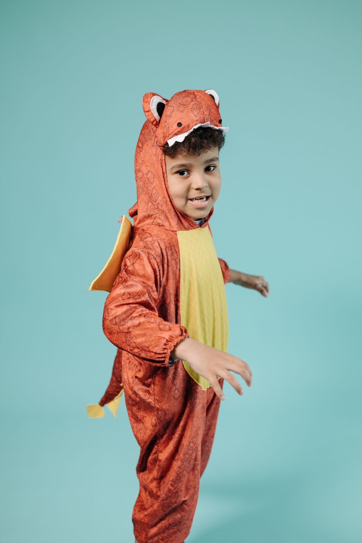 Kids dressing up in costumes for a New Year's Eve fashion show
