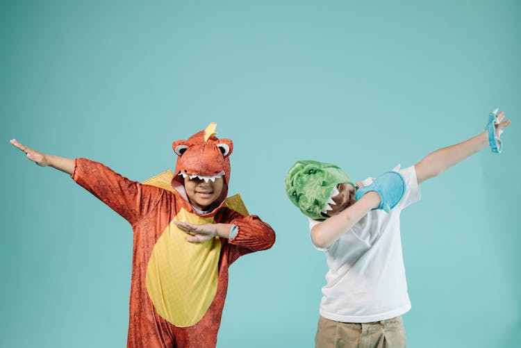 Two Boys In Dinosaur Costumes 