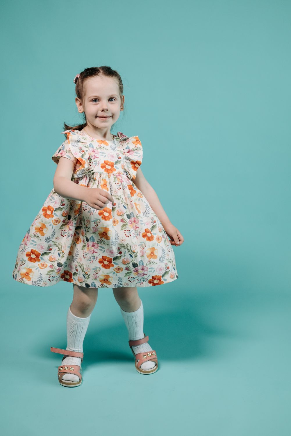 Girl in Floral Dress · Free Stock Photo