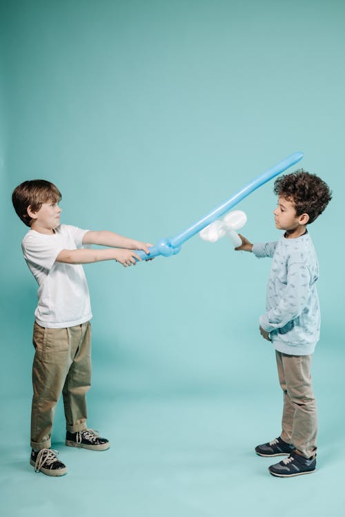 Free Boys Playing with Balloons Stock Photo