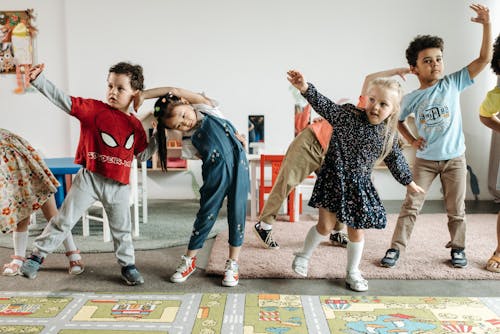 Free Kids Exercising in School Stock Photo