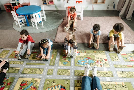 Group of diverse children performing stretching exercises in a kindergarten classroom.