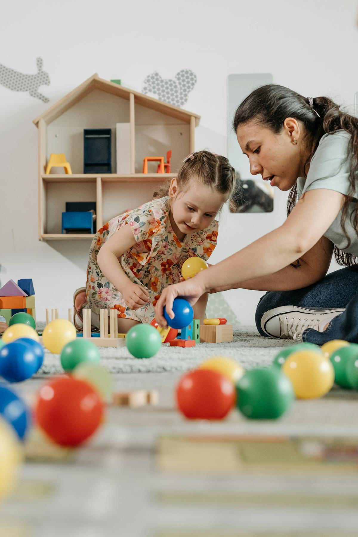 School nurse talking with a parent and child in a health office