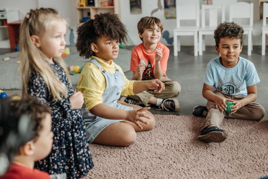 Children sitting inside a classroom