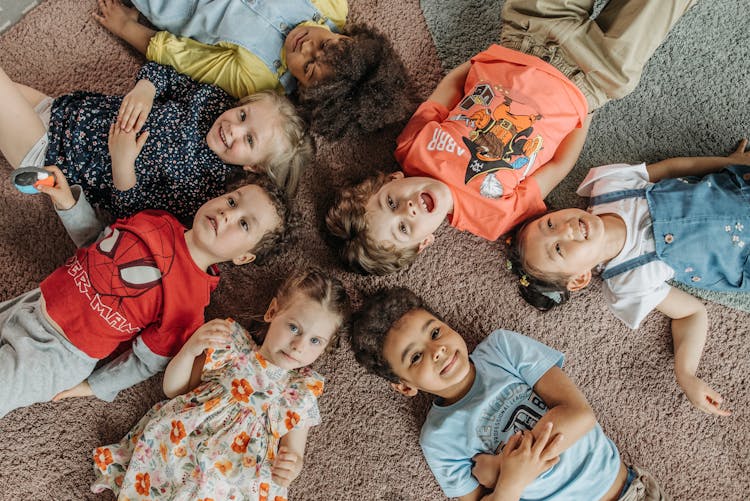 Children Lying On The Floor